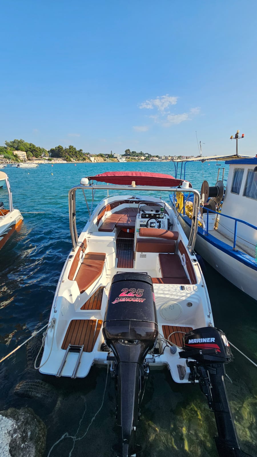 The boat moored — seating and engine